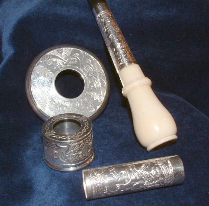 Engraved silver tuning slide, pipe chanter sole, ferrule and mouthpiece